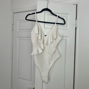 SHEIN white one piece bodysuit.